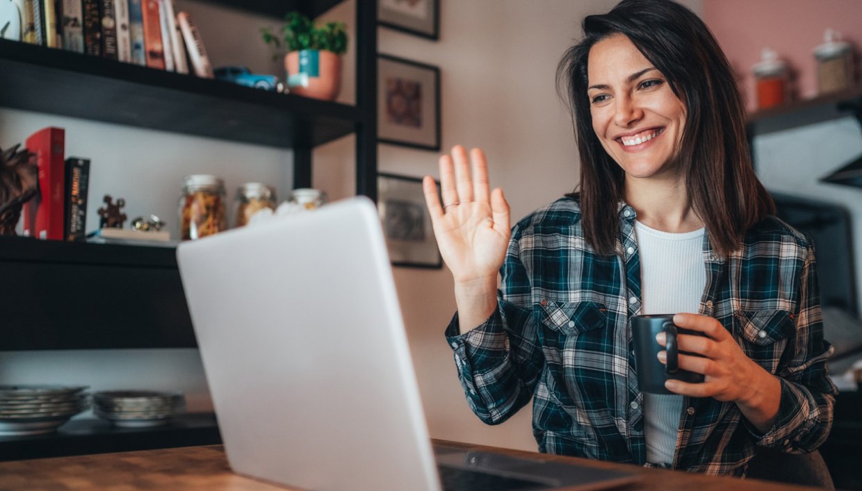 woman working remotely on laptop