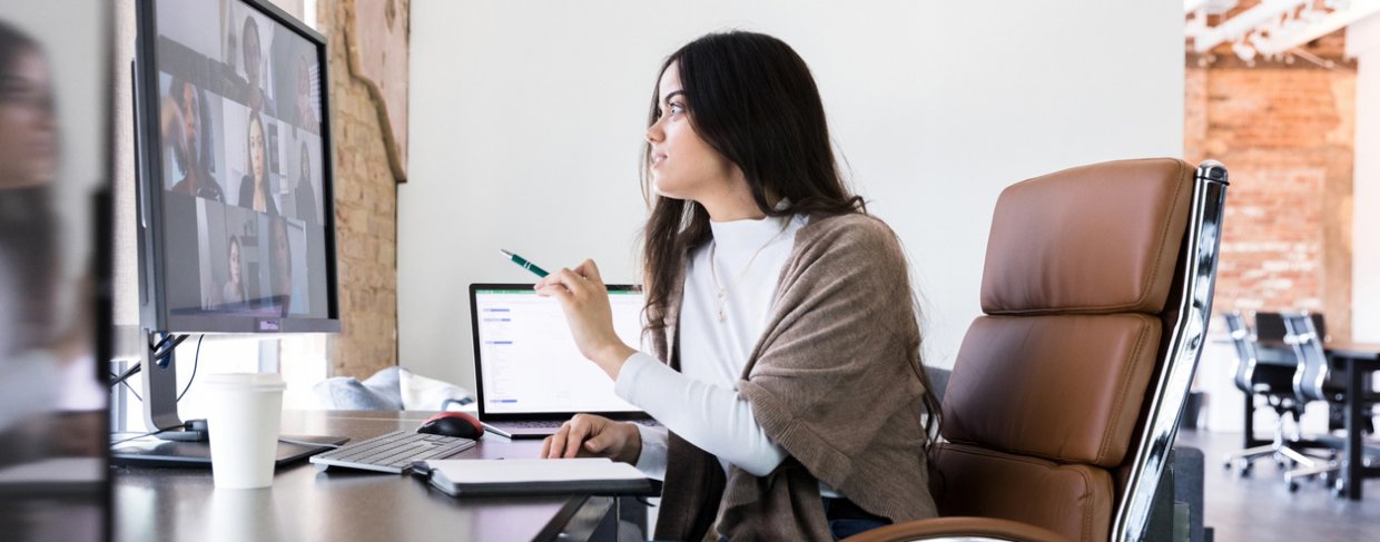 Business employee using internet for video conferencing