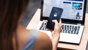 Person seeing cybersecurity alert on mobile phone